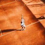 Tennis player serving at a tournament - Alexandra Eala Washington Open 2026